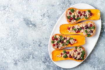 Stuffed butternut squash with chickpeas, cranberries, quinoa cooked in nutmeg, cloves, cinnamon....