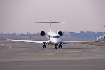 This is a view of LOT-Polish Airlines plane Bombardier CRJ-900 registered as ES-ACJ on the Warsaw Chopin Airport. March 26, 2018. Warsaw, Poland.