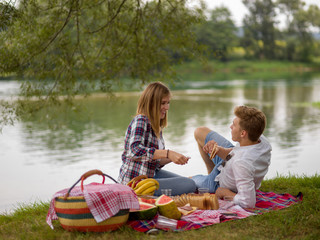 Couple in love enjoying picnic time