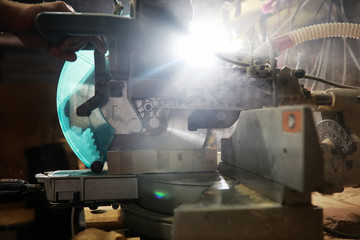 Workshop with tools and electric saws in the process