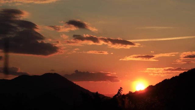 Time lapse of sunset and moving sun in Pyrenees, Aude in the south of France
