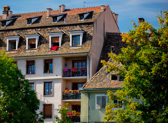 View at old houses with windows in autumn season. Strasburg, France