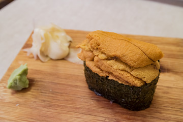 Close up shot of a delicious Uni sushi