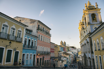Scenic dusk view of a plaza surrounded by colonial buildings in the historic district of Pelourinho, in Salvador, Bahia, Brazil