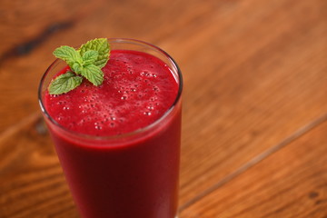 Delicious glass of beet juice and mint