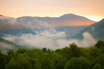 Foggy evening sunset in the mountains of Stowe, Vermont, USA