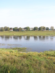 river landscape in the autumn sunny morning
