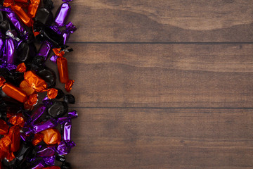 Halloween Candy Background on a Wooden Table