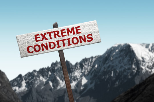 Extreme Conditions Sign On Mountains Background For Winter Weather Advisory..