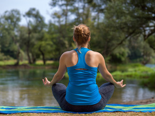 woman meditating and doing yoga exercise