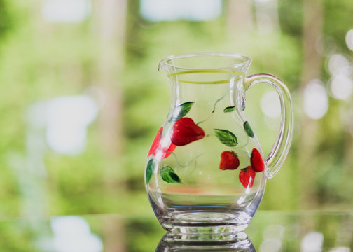 painted glass pitcher