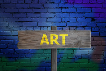 Fototapeta na wymiar Art sign on colorful graffiti background