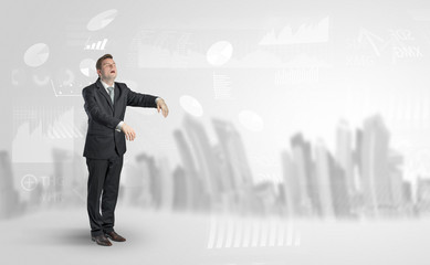 Young elegant businessman with city and report dream concept