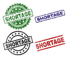 SHORTAGE seal imprints with corroded style. Black, green,red,blue vector rubber prints of SHORTAGE caption with unclean style. Rubber seals with round, rectangle, rosette shapes.