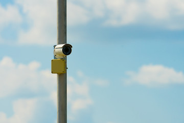 Security cameras on the pole. Place for your text.