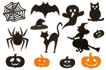 Happy Halloween Set cut out of black orange paper silhouettes pumpkin, witch, ghost, cat, owl, spider, web, hat, bat, castle isolated on white background. Concept Paper cut style. Top view