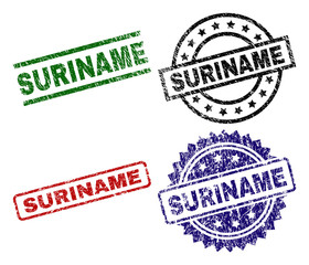 SURINAME seal imprints with damaged texture. Black, green,red,blue vector rubber prints of SURINAME text with corroded texture. Rubber seals with circle, rectangle, medal shapes.