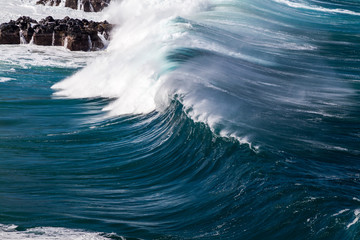 Giant Ocean Wave hitting the rocks 