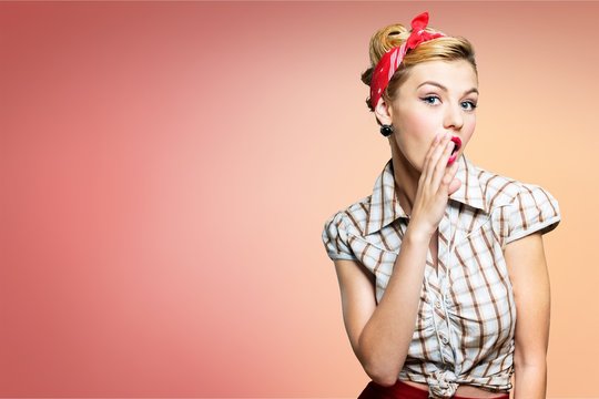 Beautiful young woman with pin-up make-up