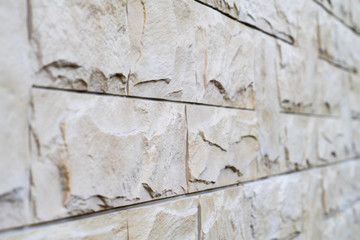 The wall is lined with stone. Place for your text.