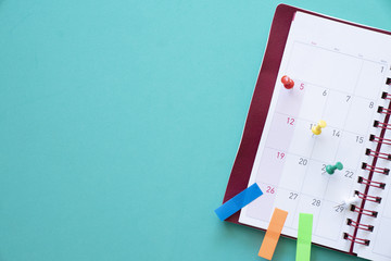 close up of calendar, planner on the green table, planning for business meeting or travel planning...