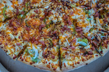 Obraz na płótnie Canvas Top down view of delicious pizza with soft cheese and various toppings
