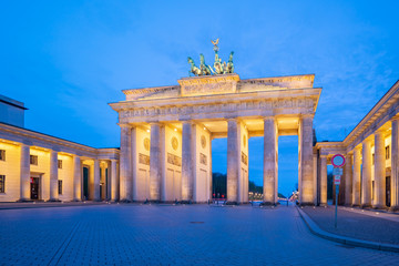 The Brandenburg Gate monument at night in Berlin city, Germany
