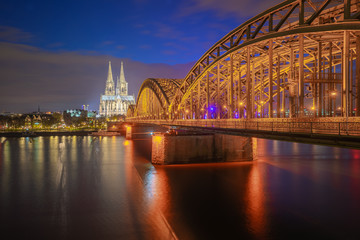 Fototapeta na wymiar Hohenzollern Bridge with Cologne Cathedral at night in Cologne city, Germany