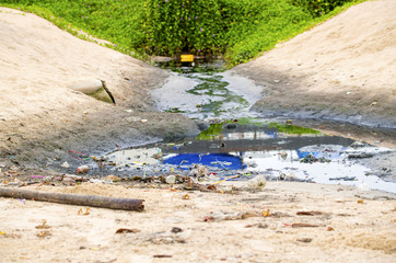 Naklejka premium The wastewater and garbage, Being dumped into the sea to make the nature destroyed and water pollution affects the environment
