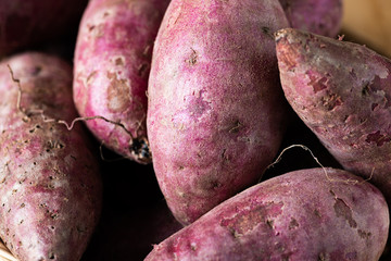 Sweet Potatoes Purple Colored on Table