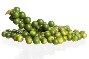 Fresh black pepper on white background