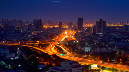 Fototapeta na wymiar panorama view of light tail on cityscape background
