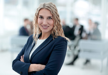 portrait of successful business woman on the background of the office