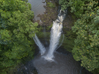 Spectacular 55-m high Fuipisia waterfall in jungle, Samoa