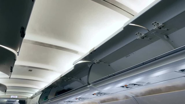 4k video of cooling airplane. Cold steam flowing from air vents at the ceiling