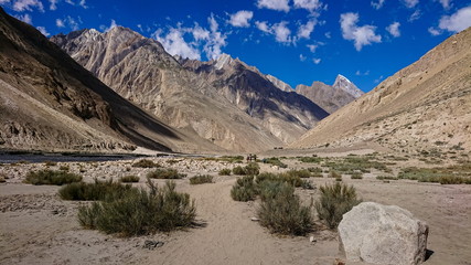 Trekking along the Braldu River in the Karakorum Mountains in Northern Pakistan, Landscape of K2 trekking trail in Karakoram range, Pakistan