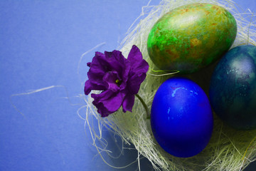 colorful Easter eggs on blue background