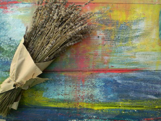 Lavender bouquet on a painted wooden board