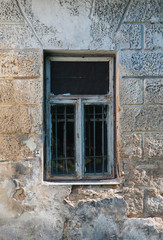 Fototapeta na wymiar Weathered grungy window