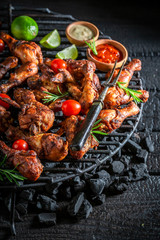 Tasty roasted chicken wings with rosemary and spices