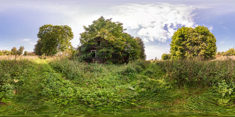 full seamless spherical panorama 360 by 180 angle view near abandoned wooden house in...