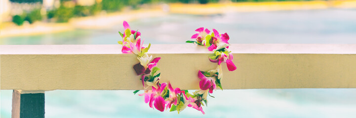 Hawaiian lei flowers necklace panoramic banner for polynesian or hawaiian culture tradition. Panorama background.