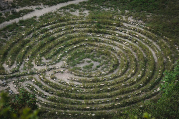 Fototapeta na wymiar Labyrinth in the grass