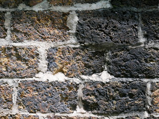 old stone wall with moss