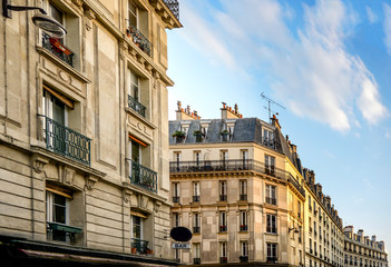 Traditional architecture of residential buildings.Old French classic house in Paris - France.