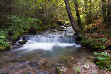 Fototapeta na wymiar Artificial waterfall; Western Carpathians, Romania