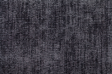 Black and white background from soft textile material. Fabric with natural texture.