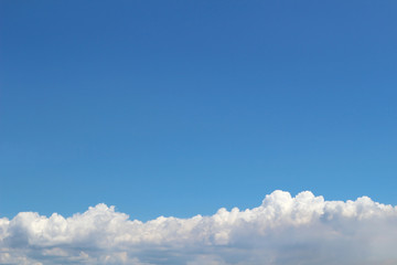 The summer cloud spreading in the blue sky