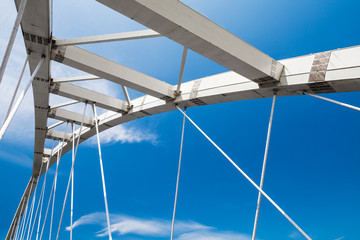 White steel cable-stayed bridge fragment