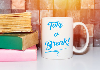 TAKE A BREAK Coffee Cup  and booksConcept